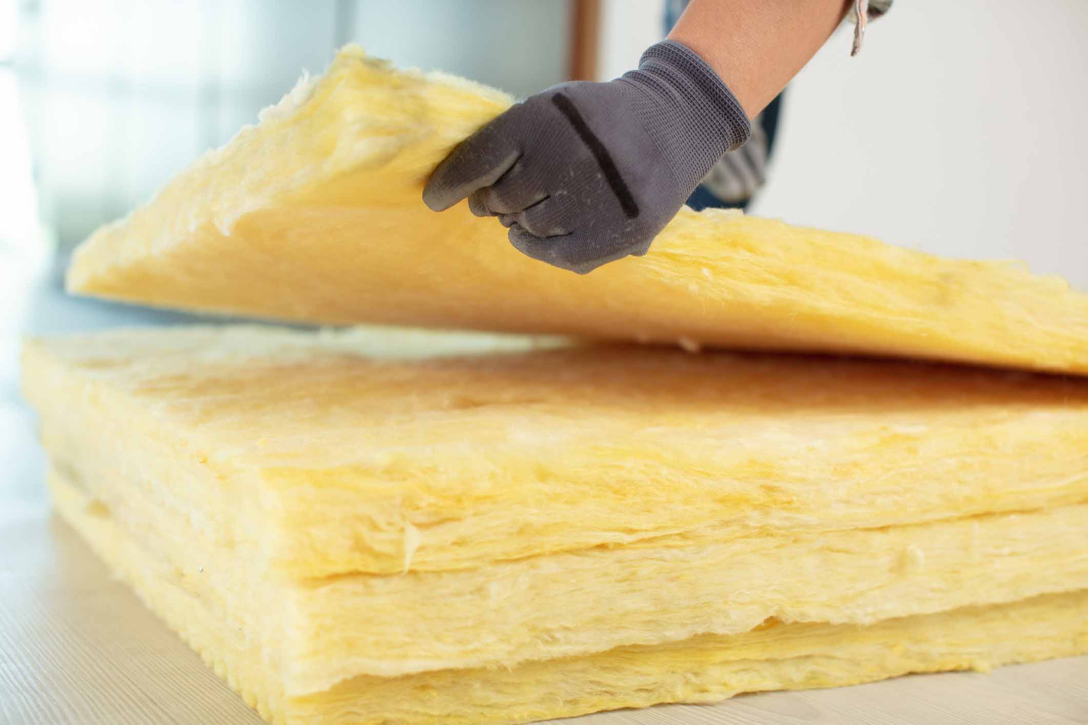 Hand holding an insulation sheet
